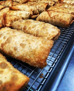 BUFFALO CHICKEN cheesesteak eggrolls.
