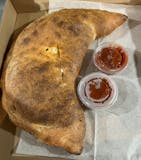 Mushrooms, Roasted Peppers & Onions Calzone