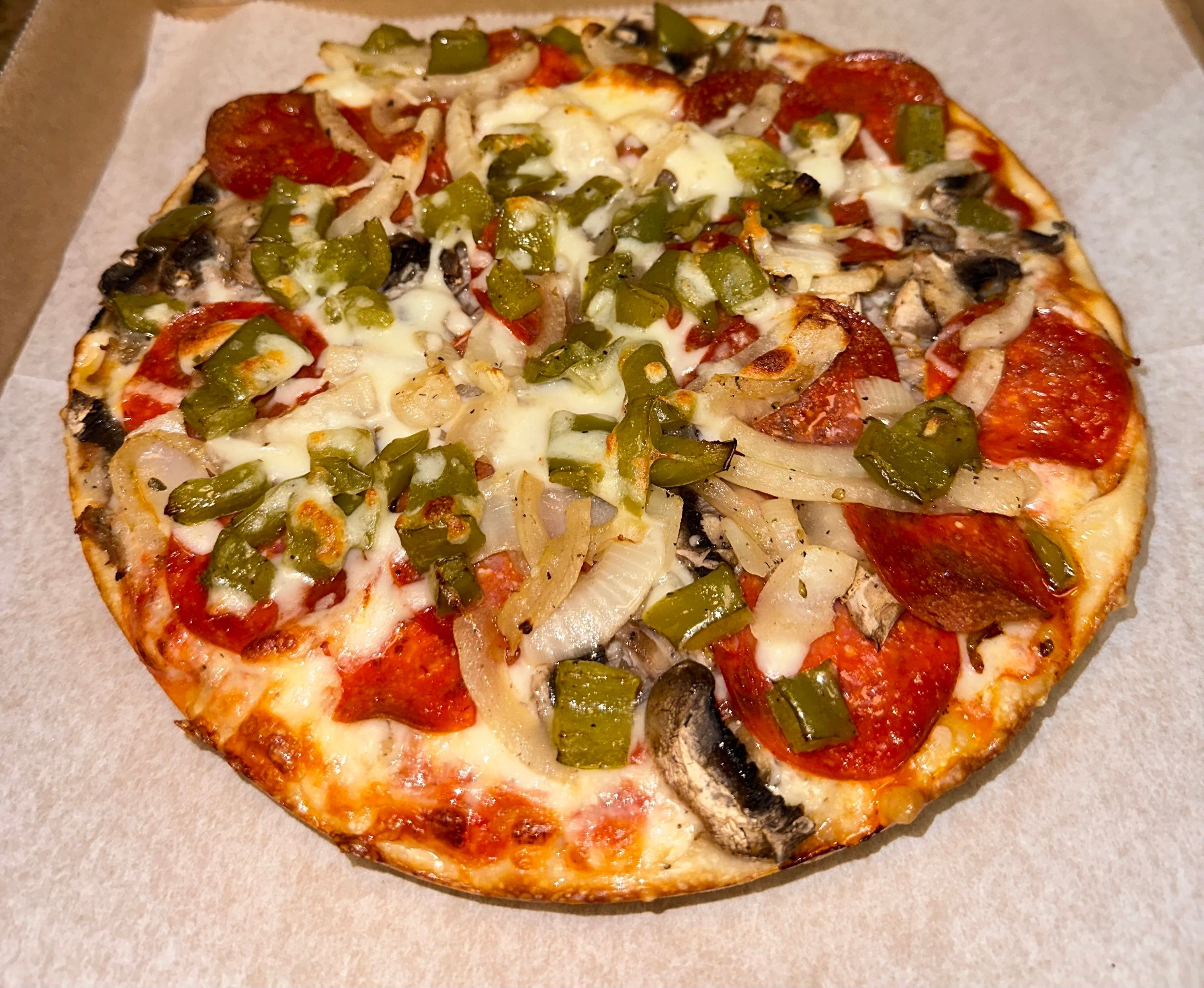 Pan thick Angelo’s Special “The Works" Pizza