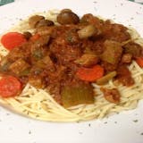 Veal Scallopini Over Spaghett