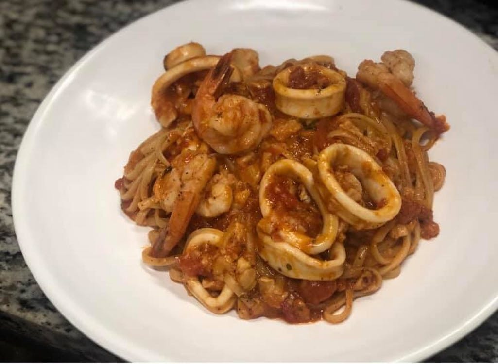 Order Frutti di Mari - Entrees food online from Portofinos Italian Restaurant store, Krum on bringmethat.com
