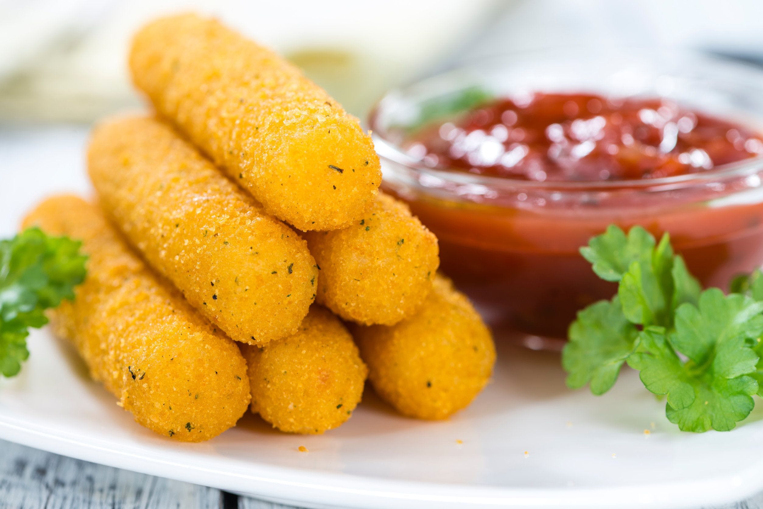 Order Fried Cheese Sticks - Appetizer food online from Portofinos Italian Restaurant store, Krum on bringmethat.com