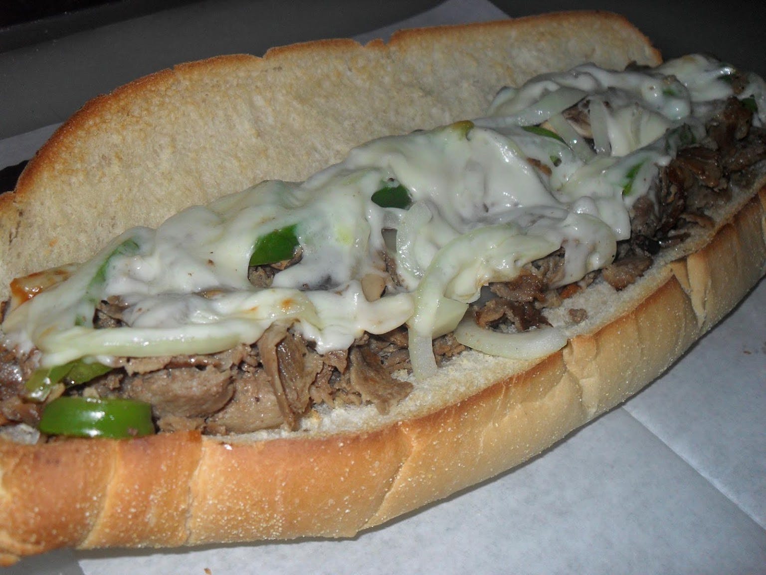 Order Philly Cheesesteak Sub - 12'' food online from Astra Pizza store, St Petersburg on bringmethat.com