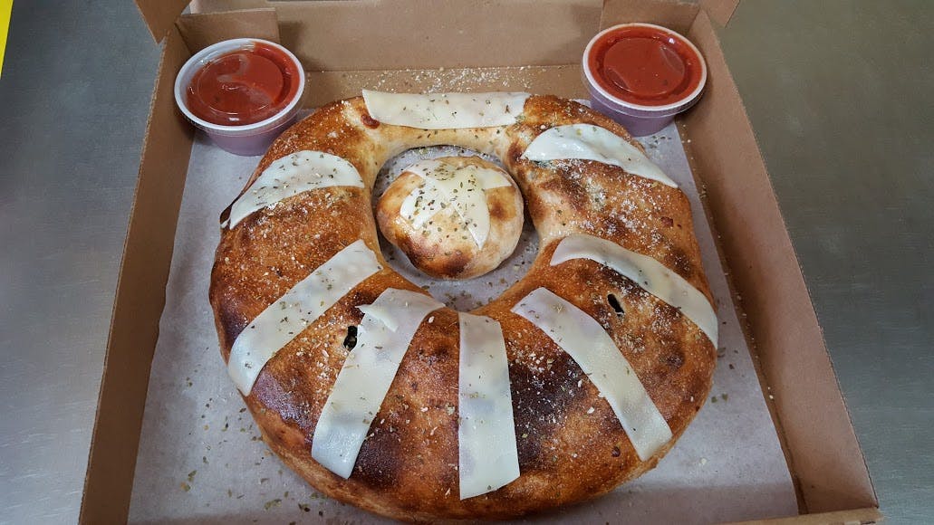 Order Stromboli - Personal food online from Astra Pizza store, St Petersburg on bringmethat.com