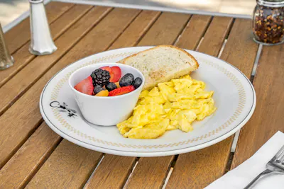 Two Jumbo Eggs Breakfast — with toast and choice of rosemary potatoes or fresh fruit
