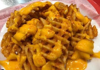 Spicy Saint LuciFries with Waffle Fries & Cheese
