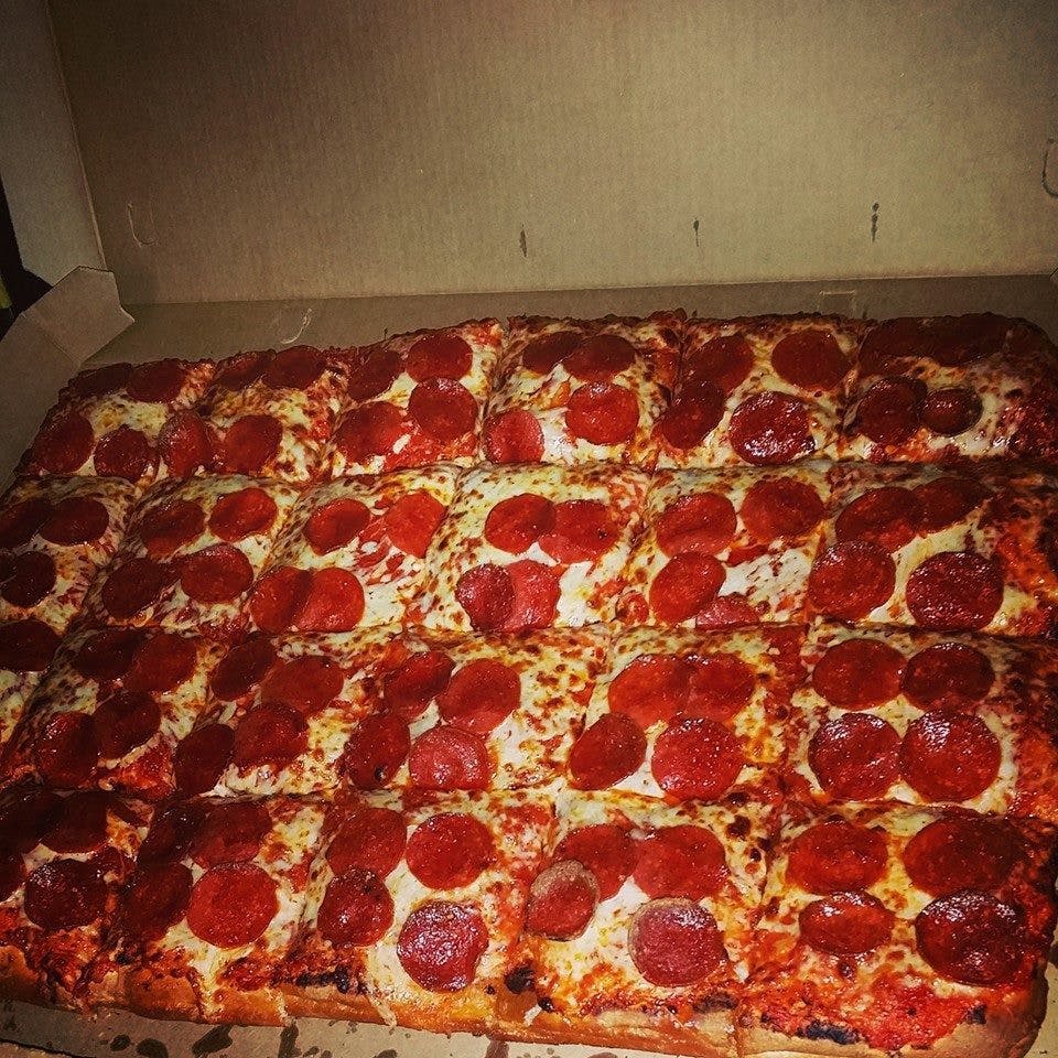 The 24 Cut Two Toppings Grandslammer Pizza Special