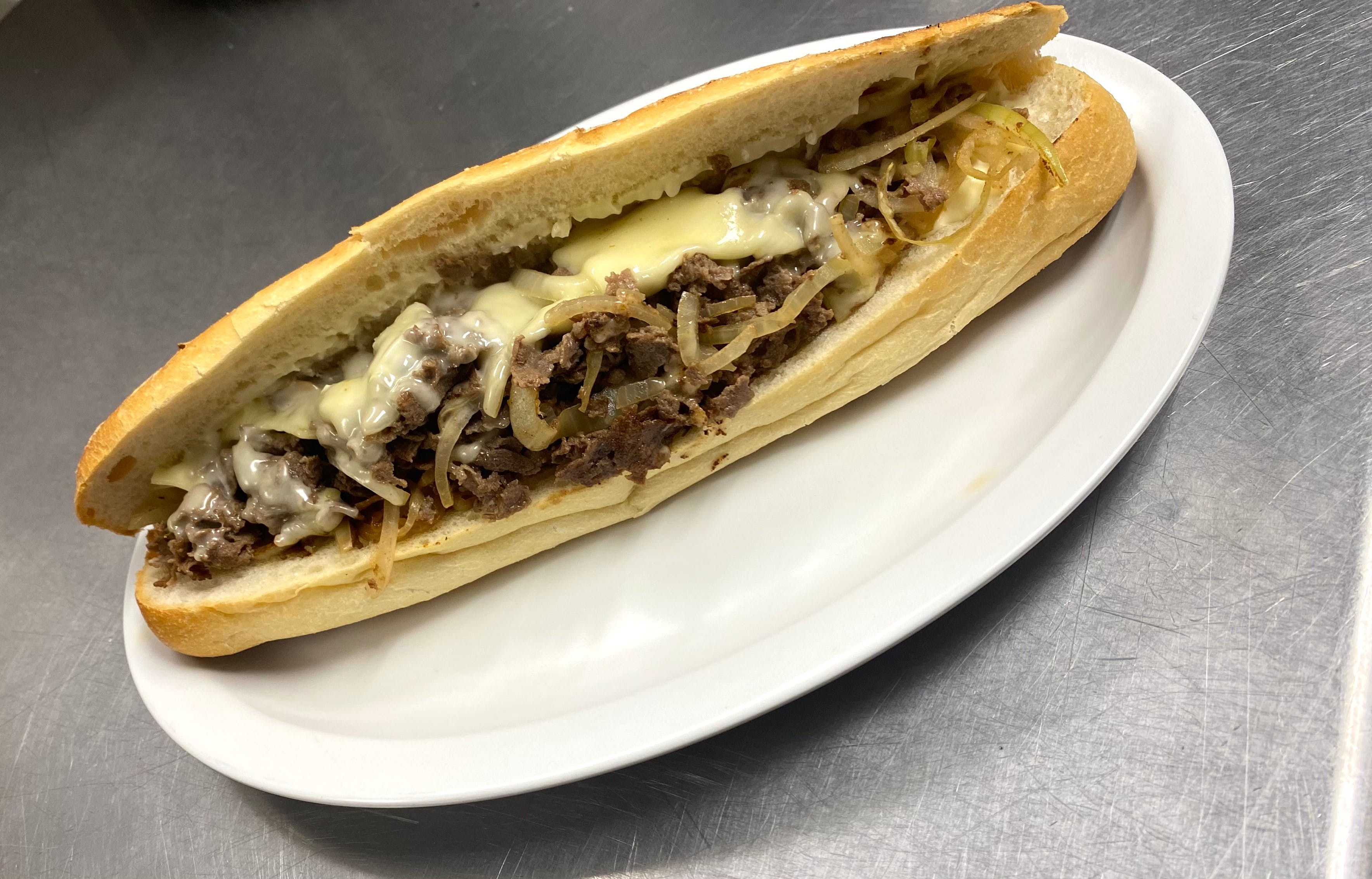 Order Philly Cheesesteak - Hard Roll food online from Italian Corner Deli By Massimo store, Trumbull on bringmethat.com