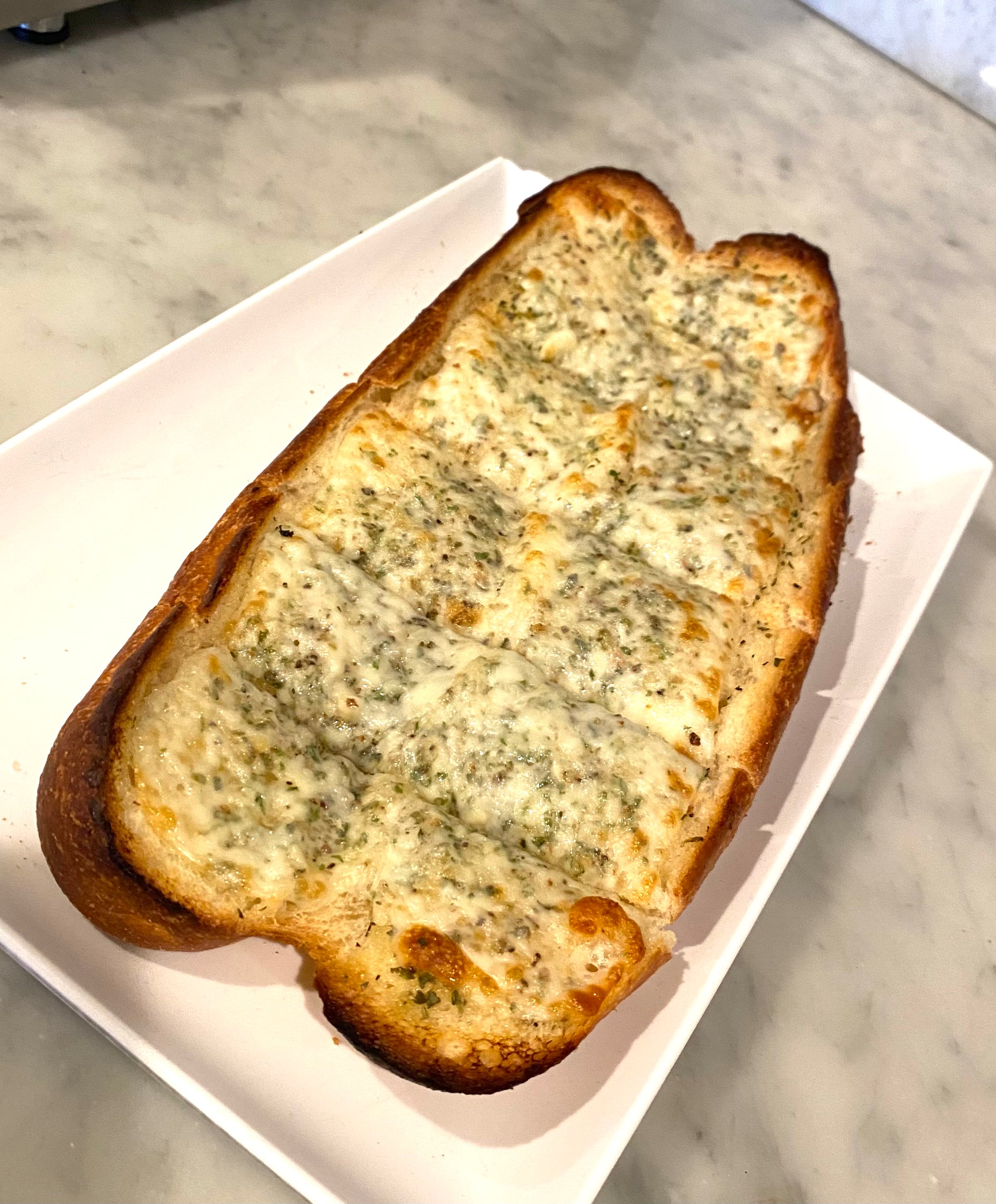 Order Garlic Bread with Cheese - Appetizer food online from Italian Corner Deli By Massimo store, Trumbull on bringmethat.com