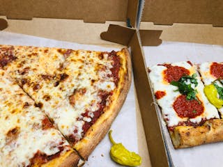 Two Slice Pizza Special+Canned Soda (2.80 Dollars in Savings)