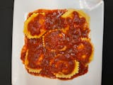 Cheese Ravioli,baked with Marinara Sauce and mozzarella cheese