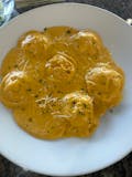 Pumpkin Ravioli in Alfredo sauce