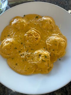 Pumpkin Ravioli in Alfredo sauce
