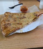 Jumbo Meat Stuffed Pizza Slice