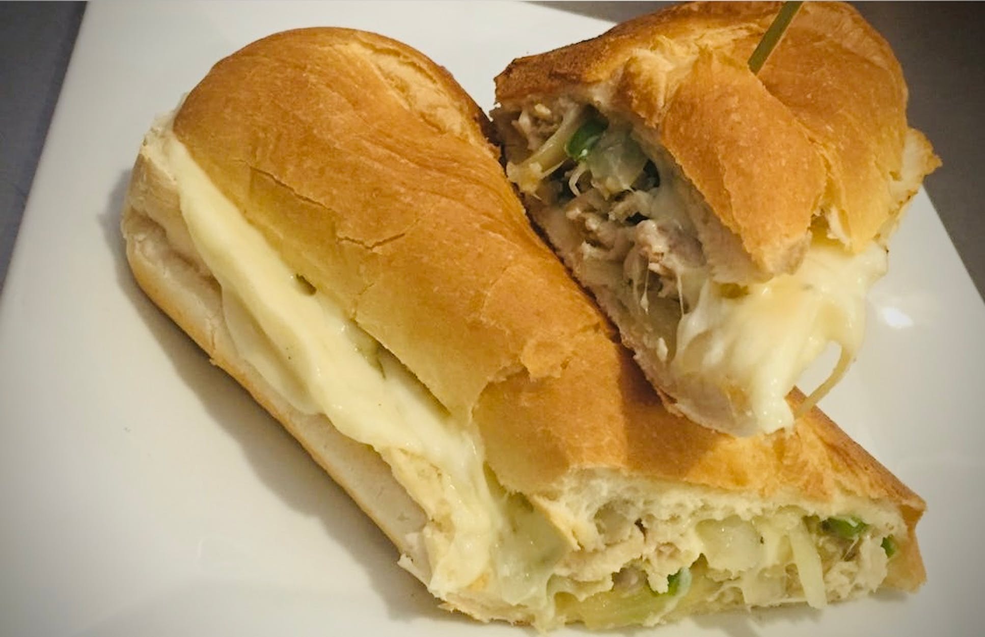 $2.00 OFF PHILLY CHEESE STEAK OR CHICKEN