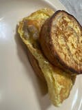 Cinnamon Swirl French Toast with Scrambled Egg, Cheddar, & Sausage Breakfast