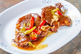 Smothered Louisiana Style Pork Chops with Rice