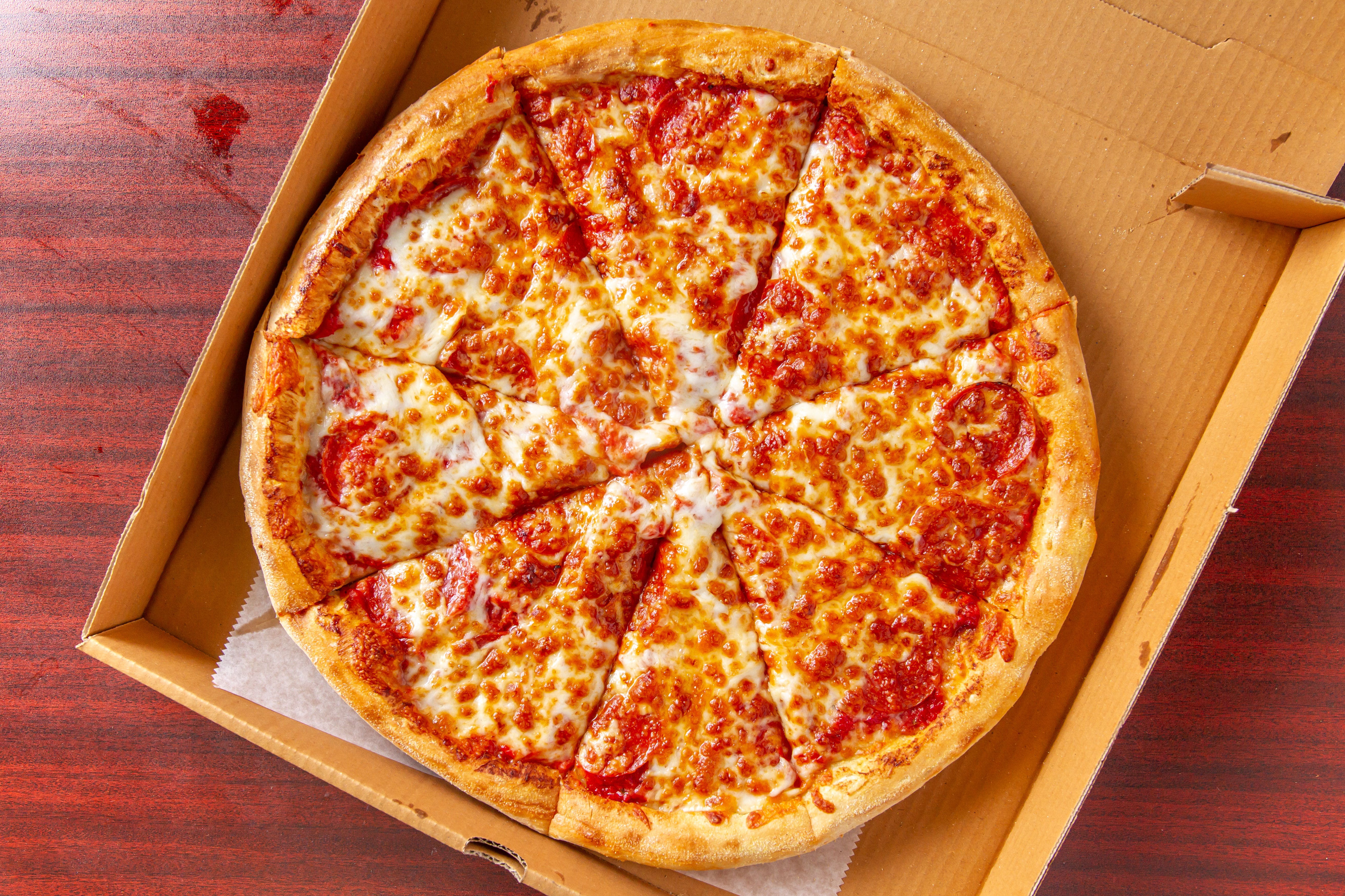 Order One Topping Medium Pizza Special - Special food online from Arlon Carry Out store, Pikesville on bringmethat.com