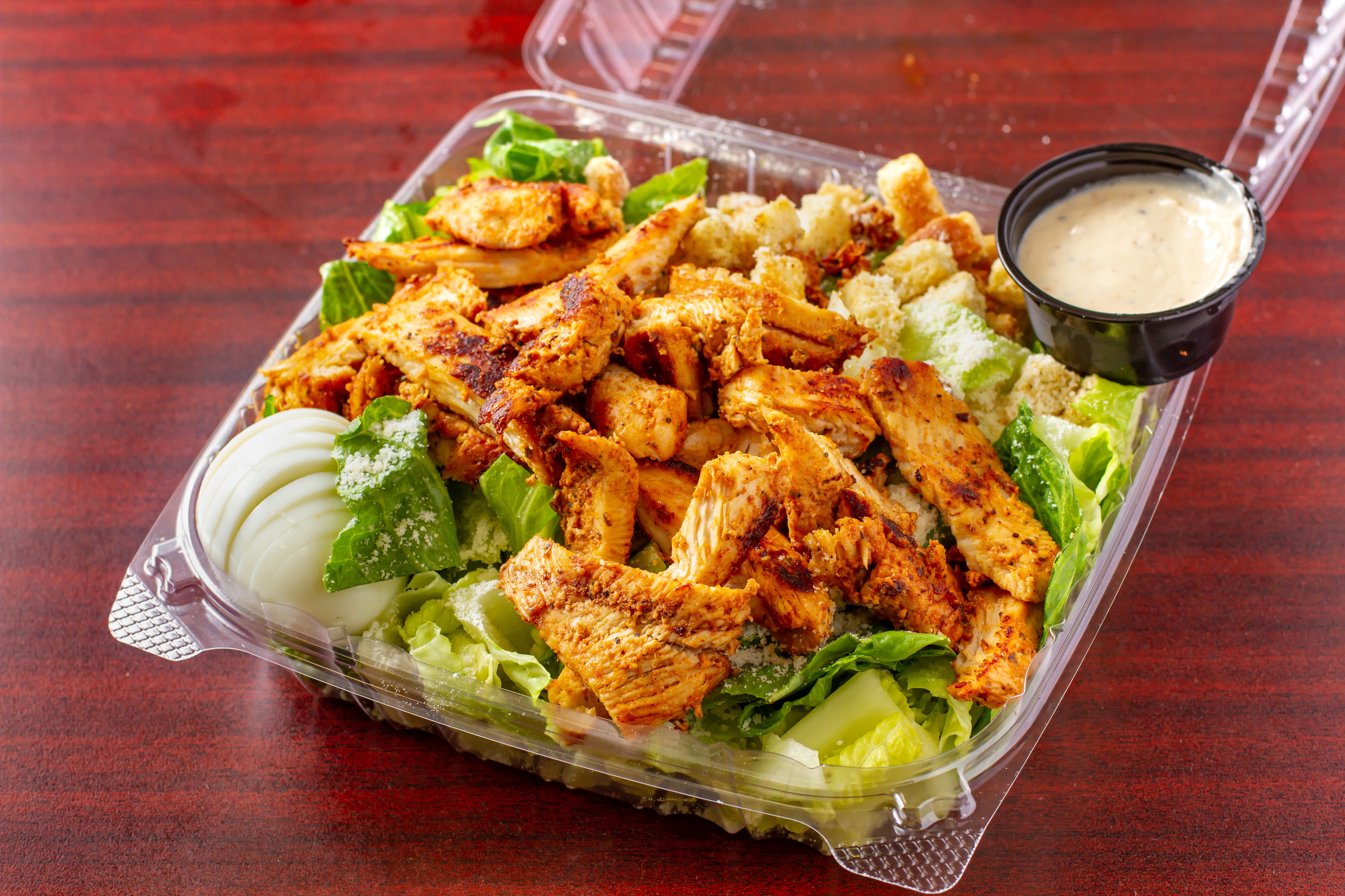 Order Romaine Caesar Salad with Grilled Chicken - Salad food online from Arlon Carry Out store, Pikesville on bringmethat.com