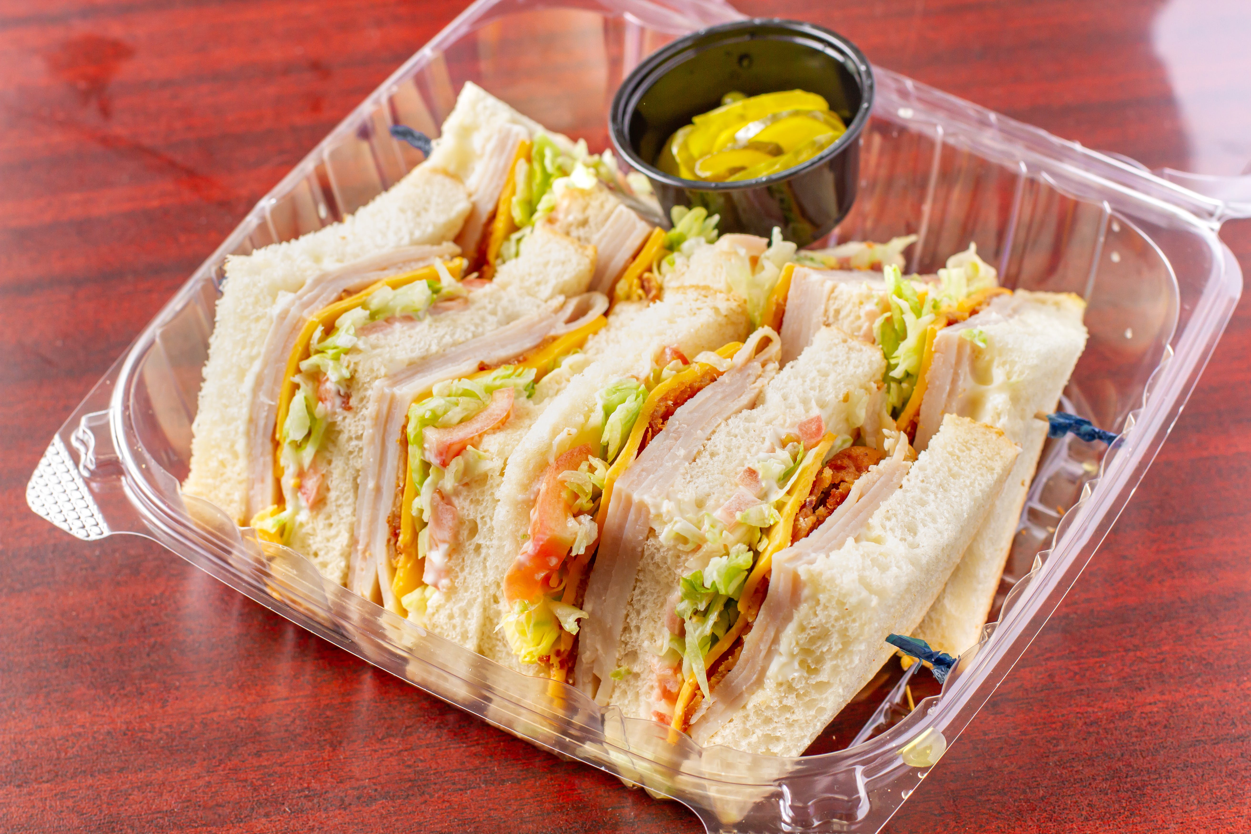 Order Turkey Club Sandwich - Sandwich food online from Arlon Carry Out store, Pikesville on bringmethat.com