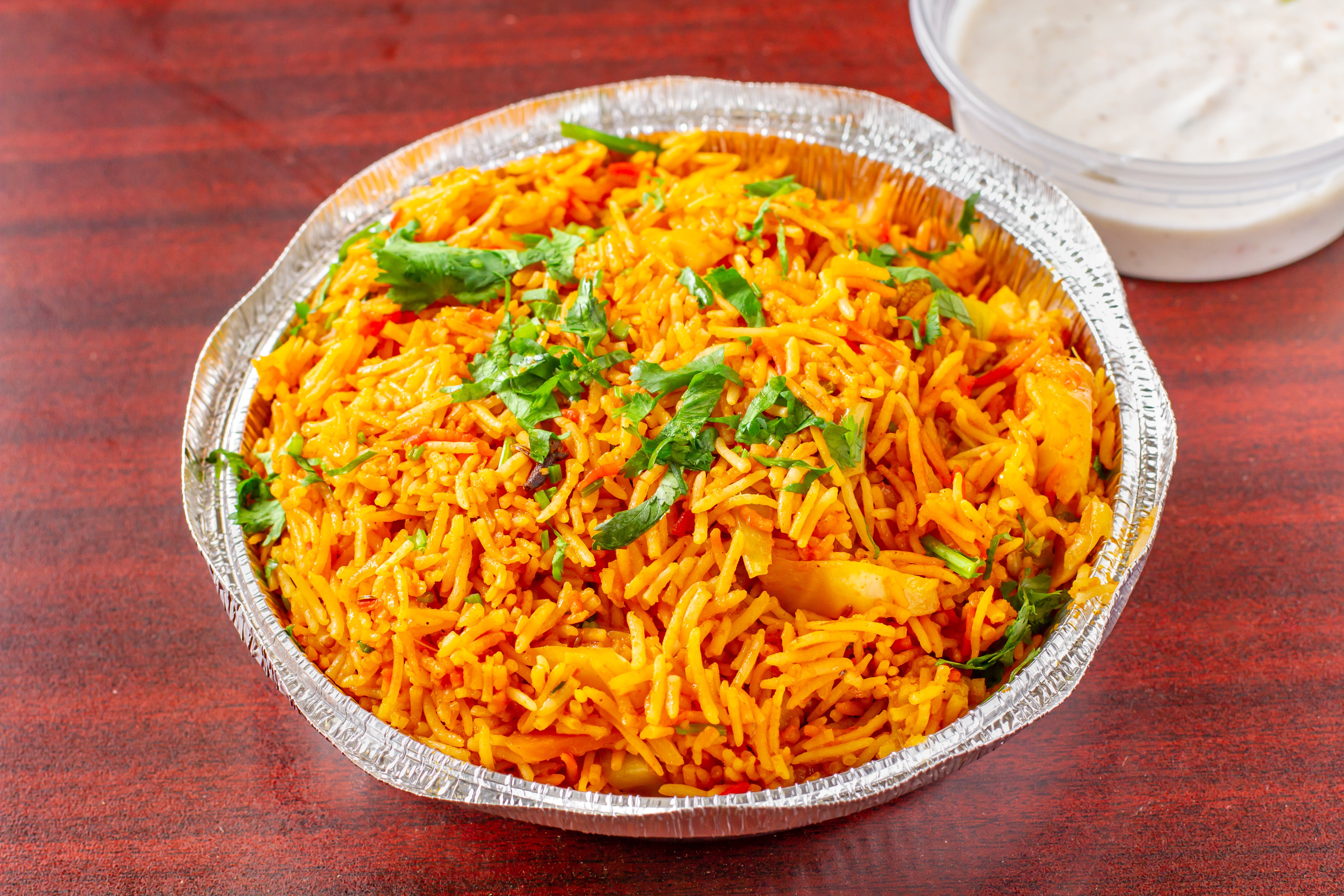 Order Vegetarian Biryani - Entree food online from Arlon Carry Out store, Pikesville on bringmethat.com