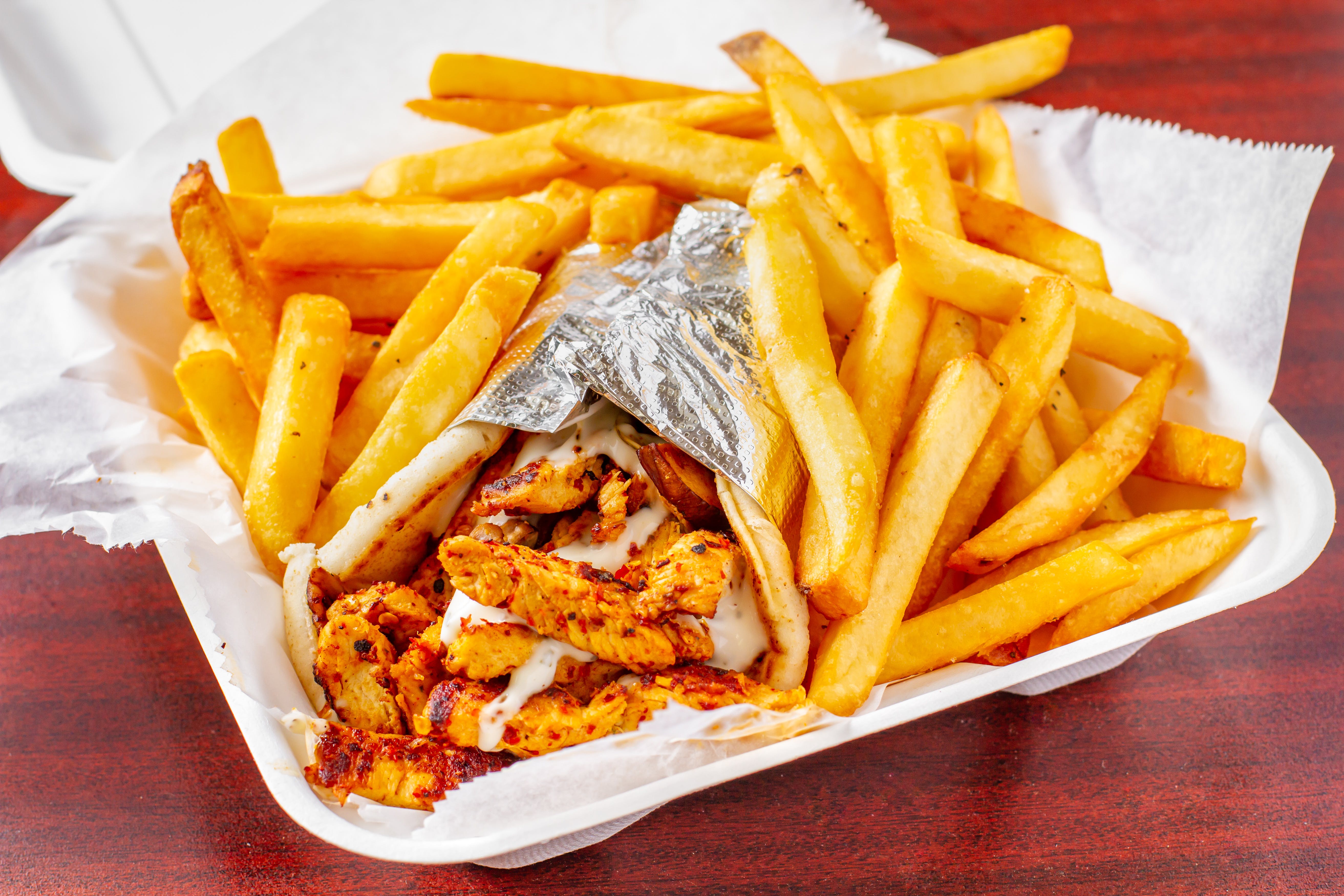 Order Chicken Gyro Combo - Combo food online from Arlon Carry Out store, Pikesville on bringmethat.com