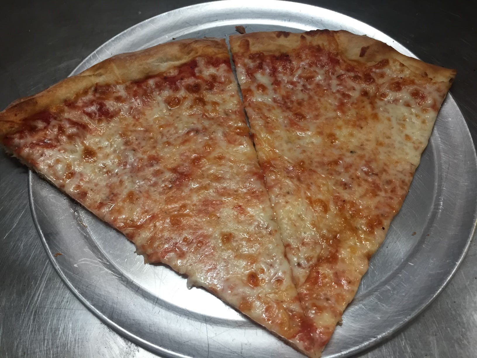 Two Slices of Pizza & Beverage Special