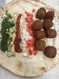 Haifa Falafel - Parsley, Tomato, Onion, Cumber Mixed With Tahini Spice.