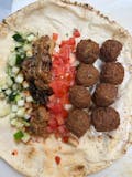 Nablus Falafel - Cucumber, Tomato, Tahini, Lemon Slice, Eggplant.