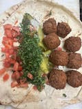 Beirut Falafel - Pickles, Tomato, Parsley, Tahini, Mint.