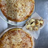 Two 16'' Large Pizzas with One Topping Each & Dozen Garlic Rolls Special
