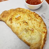 Sausage peppers &onion calzone