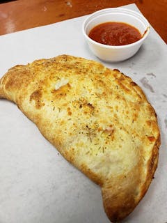 Sausage peppers &onion calzone