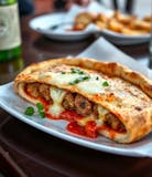 Emerald City Meatball Calzone