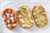 Three Ancient Bread Pizzas