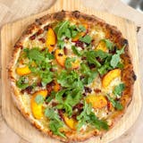 Summer Peach, Bacon, and Blue Cheese Pizza