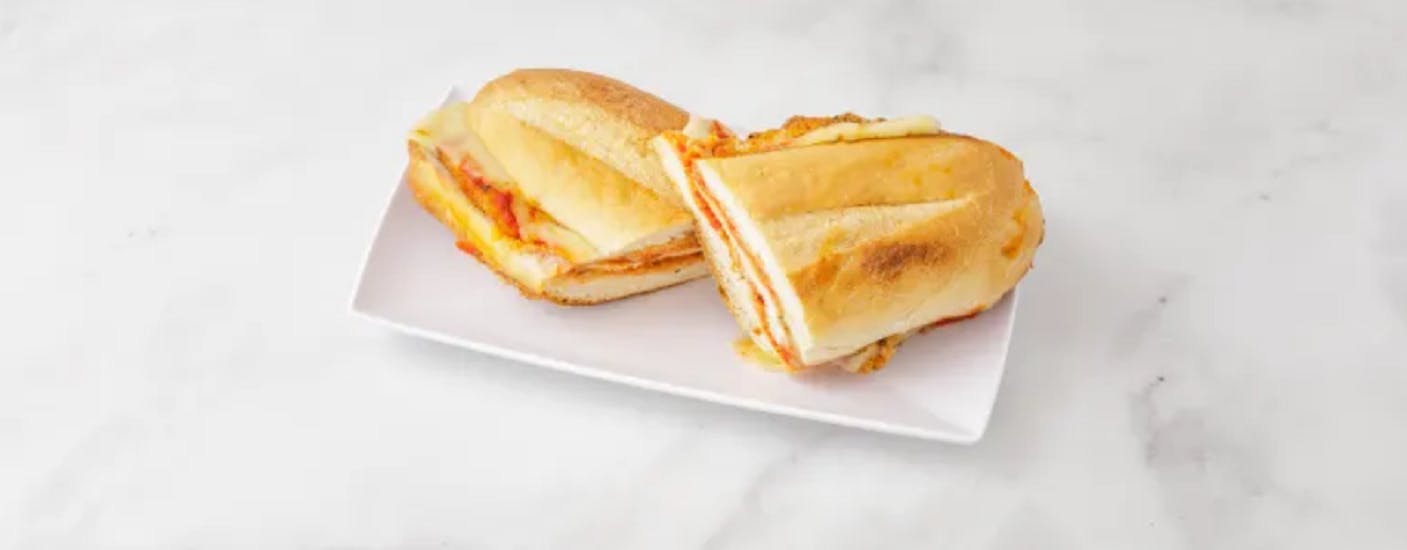 Order Chicken Cutlet Parmigiana Hot Hero - Hero food online from Martiniello's store, Queens on bringmethat.com