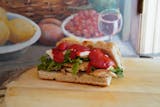 Grilled Chicken Arugula, Fresh Mozzarella Roasted Peppers Panini