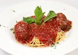 Penne and Meatballs Served with a Dollop of Ricotta