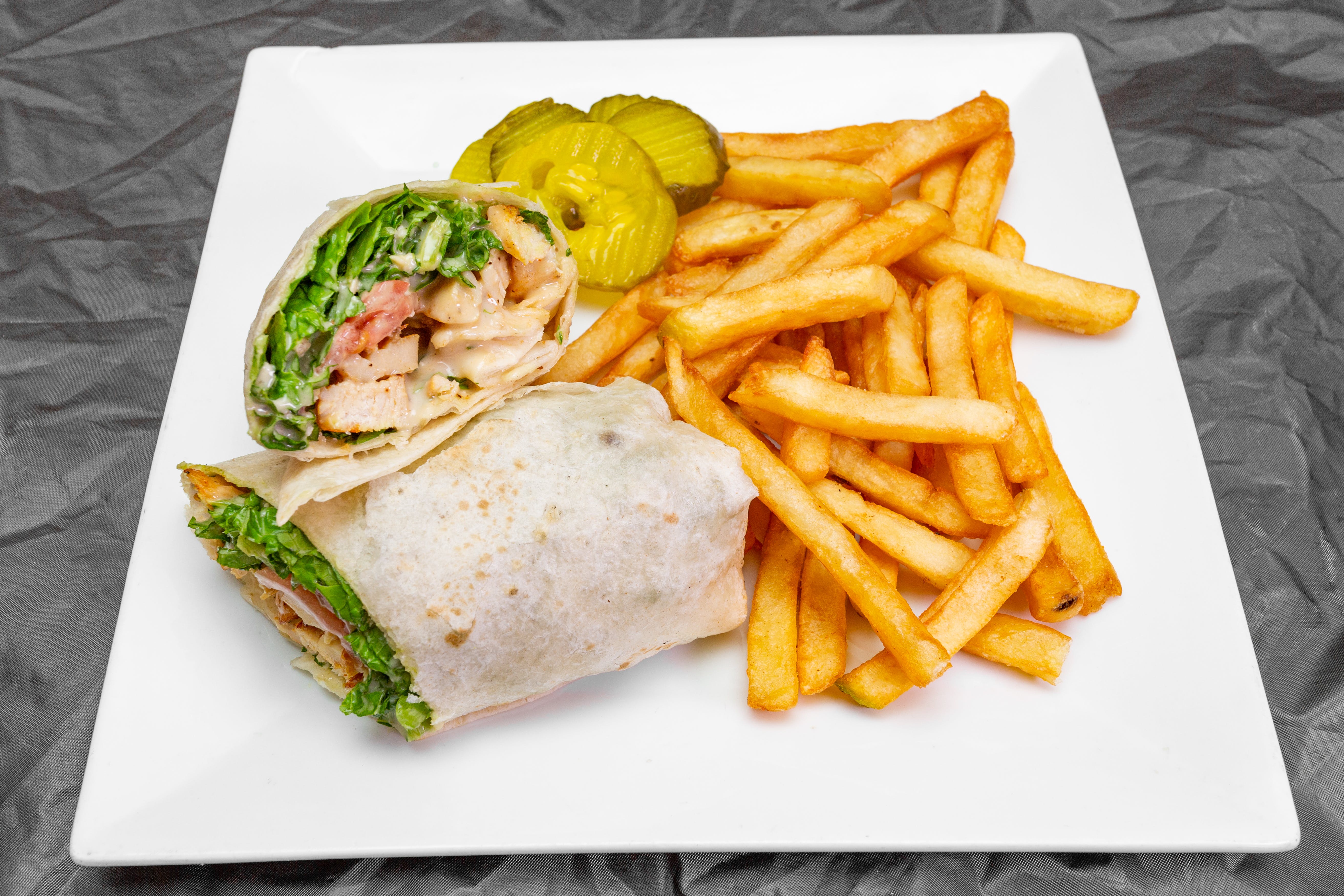 Order Chicken Caesar Wrap - Wrap food online from My New Place Pizzeria & Italian Restaurant store, Easton on bringmethat.com