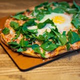 Arugula, Garlic & Sunny Side Eggs Pizza