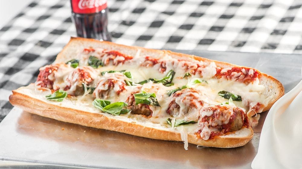 Order The Bomb Parm On Caesar Salad - Regular food online from Nonnas 1977 Bell Blvd store, Queens on bringmethat.com