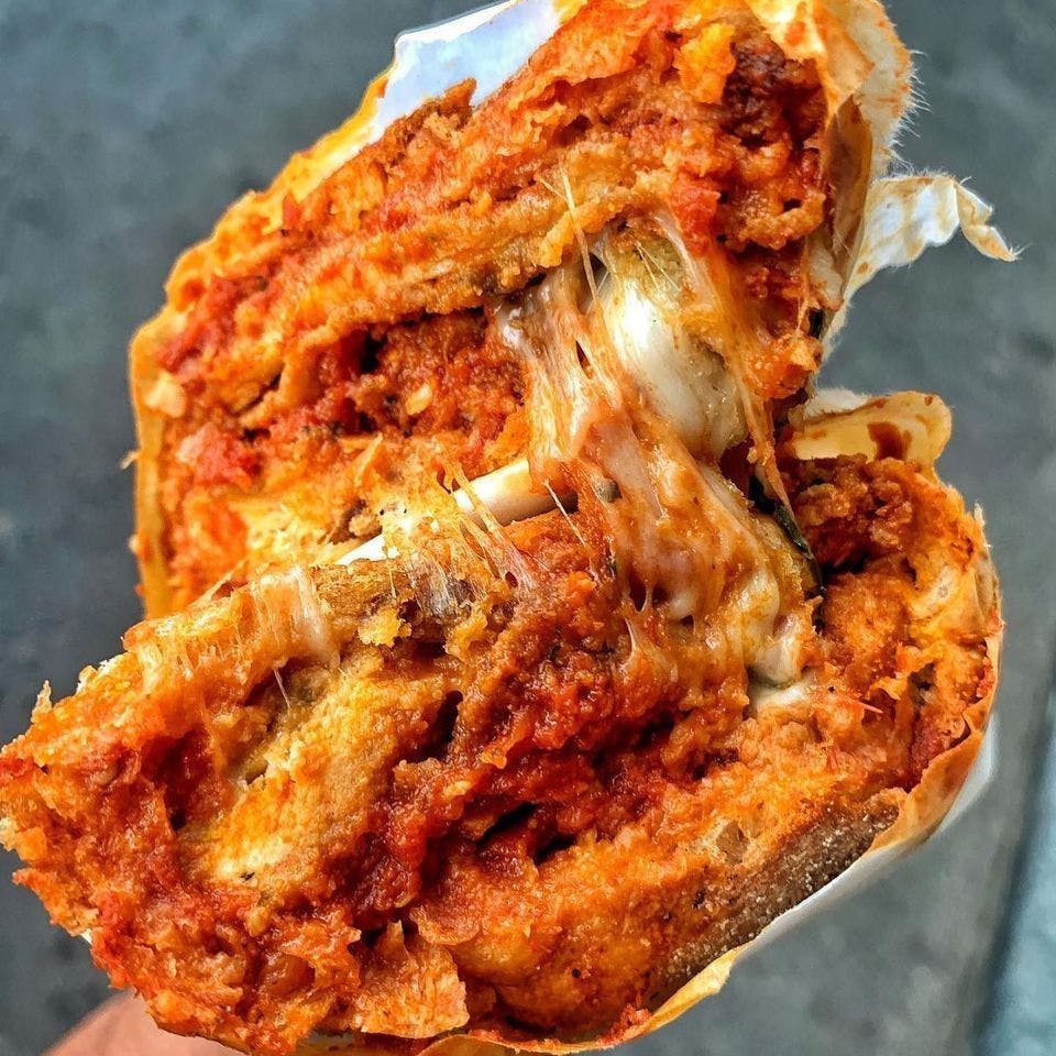 Order The Bomb Parm On Hero Bread - Regular food online from Nonnas 1977 Bell Blvd store, Queens on bringmethat.com
