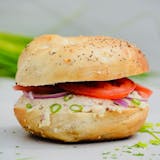 White Fish, Tomato & Red Onions Bagel Breakfast