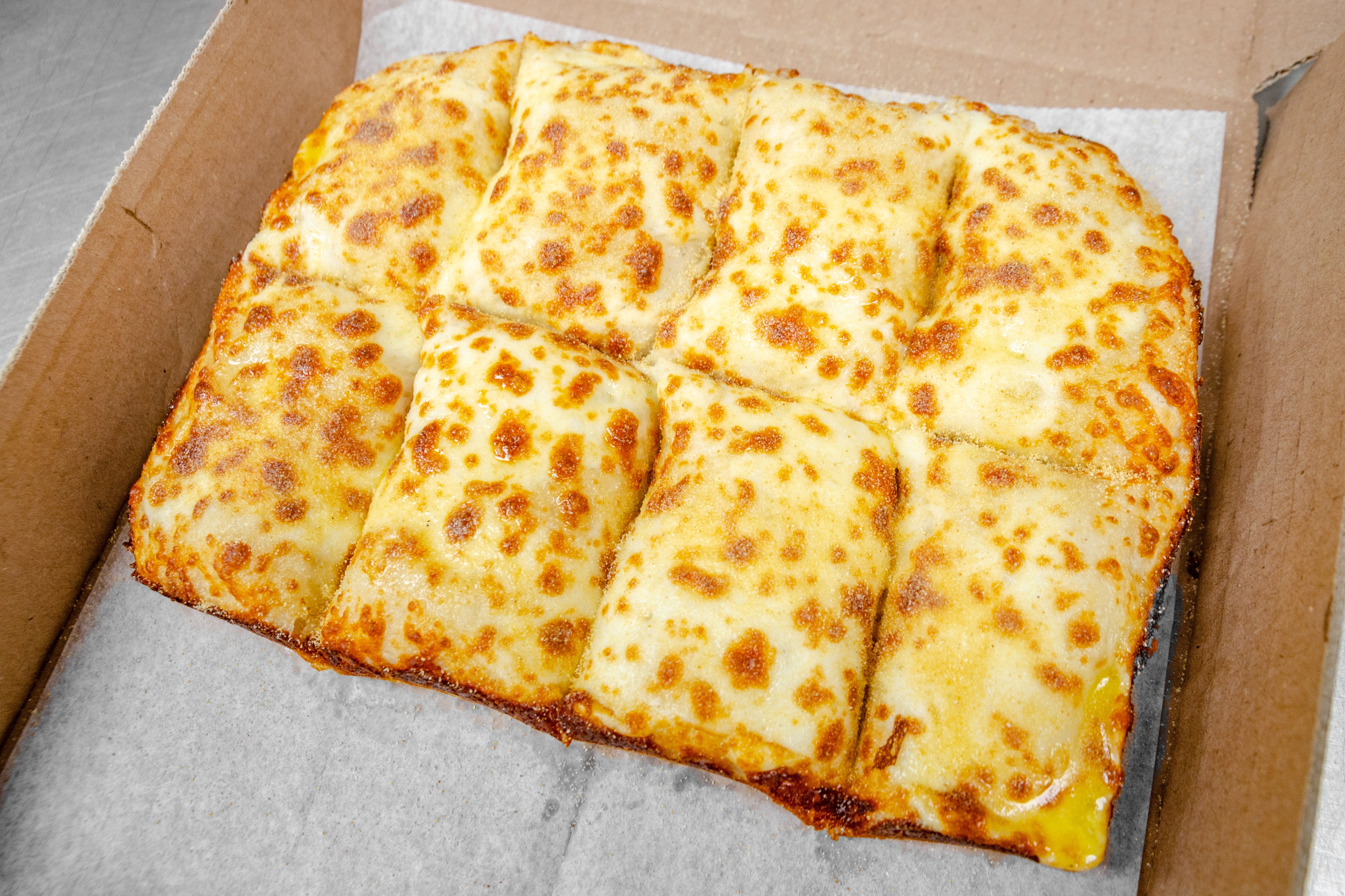 Order 1. Garlic Bread - Appetizer food online from Little Cheers Pizza store, Queens on bringmethat.com