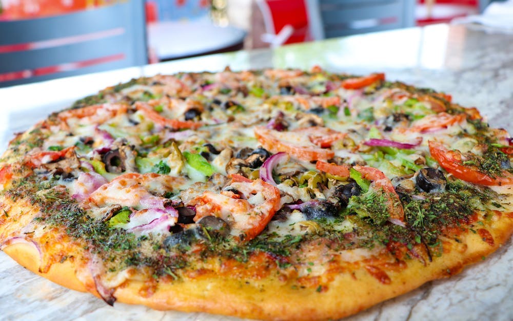 Order Touchdown Pizza - Medium 12'' food online from Center Court Pizza & Brew store, League City on bringmethat.com