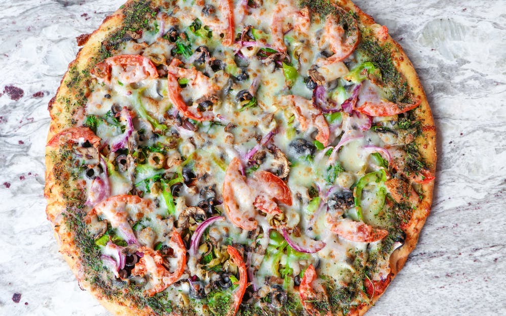 Order Herbivore Pizza - Medium 12'' food online from Center Court Pizza & Brew store, League City on bringmethat.com