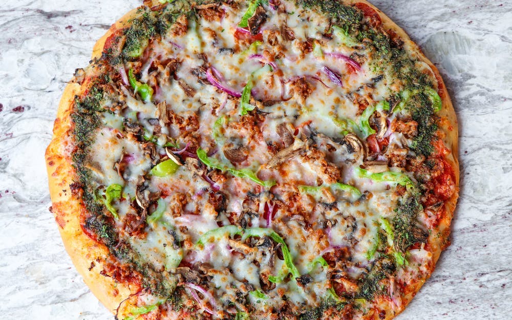 Order Free Throw Pizza - Medium 12'' food online from Center Court Pizza & Brew store, League City on bringmethat.com