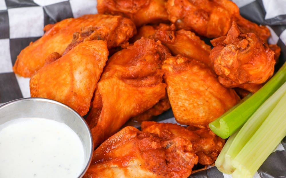 Order Boneless Wings - 12 Pieces food online from Center Court Pizza & Brew store, League City on bringmethat.com