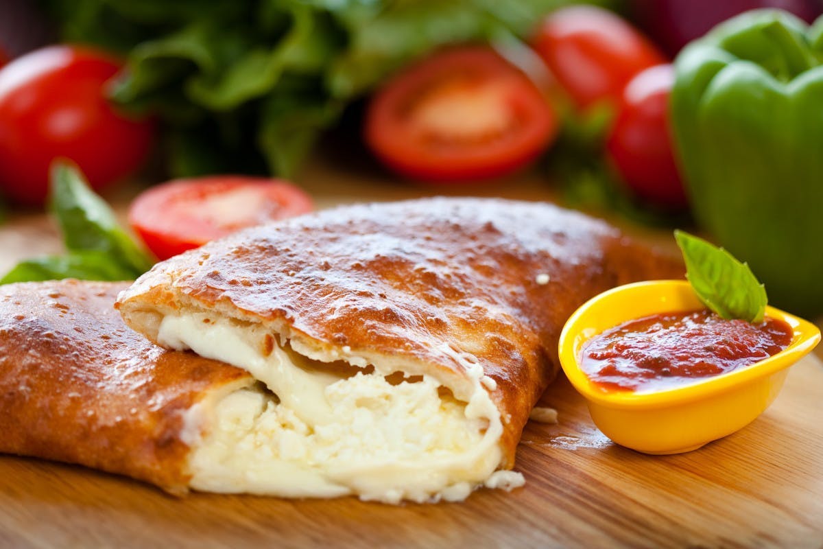 Order Spinach Calzone - For One food online from Rosetta Pizza store, Nesquehoning on bringmethat.com
